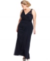 Xscape's plus size gown features beaded shoulders and gathered detail for a sweeping, flattering fit.