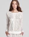 Cozy up by the fire with someone special in Kensie's sumptuous fleece top with romantic lace sleeves.