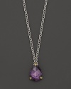 Detailed in 18K yellow gold, this Judith Ripka pear stone necklace frames a faceted purple crystal.