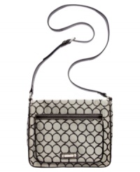 Add some signature style to your tech accessorizing with this jacquard logo silhouette from Nine West. Button snap and top zip closures securely stow iPad when you're on-the-move, while the convenient crossbody strap keeps hands free.