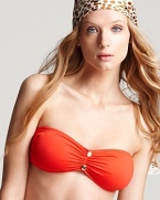 Get a little color with Juicy Couture's cinched bandeau top. In a vivid orange hue, this style packs a plunge worthy pop with a sheer kaftan and pair of flat sandals.