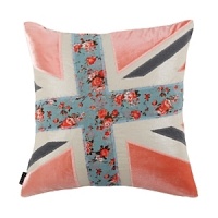 A fun, modern take on the Union Jack. Fashioned out of rose velvet, charcoal grey linen and fab floral-print appliqués on a metallic linen base, this pillow reverses to solid metallic linen.