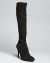 Stuart Weitzman brings his signature craftsmanship into an iconic high heel dress boot style, with stretch shafts for a perfectly lean and leggy fit.