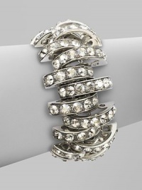 Bold, open arcs set with shimmering faceted Swarovski crystals.CrystalSilverplatedWidth, about 1Length, about 6½Hidden magnetic claspMade in Italy