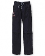 Sporty track pants by GUESS Kids get a stylish accent with logo details and a drawstring waist.