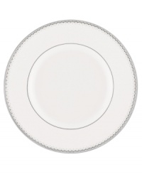 Start out any dinner in style with this fine china bread and butter plate. From innovative designer Monique Lhullier, it features a platinum-edged tiered scallop pattern on creamy white.