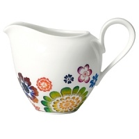 Bright, cheerful blooms traverse this premium bone-china creamer from Villeroy & Boch. Mix it and match it with other pieces in the collection for endless creative combinations.