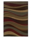 An undulating pattern replete with deep, saturated hues imbues your space with stylish sophistication. Woven from super soft polypropylene for superior stain resistance and durability, this magnificent area rug from Sphinx will maintain its lush texture and rich coloration for years to come. (Clearance)