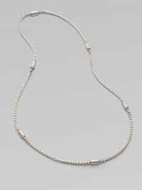 A intricately woven piece accented periodically with oblong station beads. Sterling silver Length, about 24 Imported 