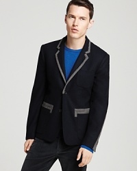 MARC BY MARC JACOBS brings wit to your wardrobe with this clever blazer, featuring cool contrasts at the collar, pockets and back of the sleeves for fun designer flair.