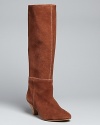 Long and tall with Western spirit, these Cynthia Vincent pointed toe boots combine cowgirl influences with '70s style.