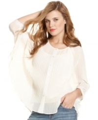 Overflowing in delicate pleats, Jessica Simpson's dolman sleeve top pairs novel design with ethereal style.