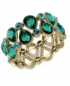 Make a colorful splash with this stretch bracelet from 2028. Crafted from gold-tone mixed metal, the bracelet features green glass and blue zircon beads for a stunning effect. Approximate diameter: 2-1/2 inches.