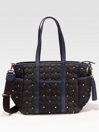 Rebecca Minkoff created a signature bag for the stroller set, featuring a detachable shoulder strap, matching changing pad and plenty of inside and outside pockets to tote all of baby's necessities.Double top handles, 8 dropDetachable