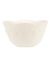 With fanciful beading and a feminine edge, this Lenox French Perle fruit bowl is a great addition to your white dinnerware and has an irresistibly old-fashioned sensibility. Hard-wearing stoneware is dishwasher safe and, in a soft white hue with antiqued trim, a graceful addition to any meal.