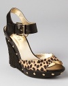 With just a flash of leopard print and gold-tone hardware, GUESS's Tabari wedges are a lesson in fashionable balance.