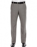 Flat front dress pants with two trouser pockets. Wool blend. Two welt pockets on back. Zip fly and hook closure.