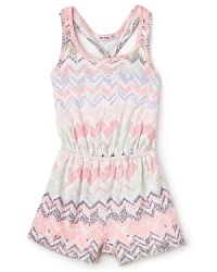 Blushing tie-dye style chevron stripes bring a retro flavor to the Santana romper.