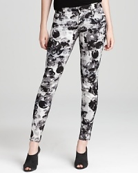 Sanctuary skinny jeans are in full bloom, enriched by a crisp-looking floral print in a classic five-pocket silhouette.