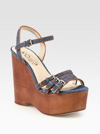 Skinny, adjustable straps in dazzling denim with leather trim and a towering wooden wedge. Wooden wedge, 5 (125mm)Wooden platform, 2 (50mm)Compares to a 3 heel (75mm)Denim and leather upperLeather lining and solePadded insoleImported