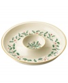 Lenox's popular Holiday pattern - a colorful holly and berry motif - on ivory fine china is the perfect way to add warmth to any gathering. Accented with 24 karat gold.