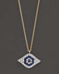 Diamonds and blue sapphires in 14K. yellow gold from a dazzling evil eye necklace. By Meira T.