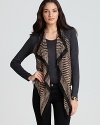 Chevron takes on a draped silhouette in this draped Akiko vest in luxe silk.