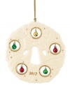 Combining sculpted ivory porcelain with gold trim and colorful jingle bells, this 2012 Lenox wreath ornament strikes a perfect balance between timeless style and festive spirit.