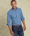 A classic fit and plaid design make this Tommy Hilfiger shirt an excellent casual wardrobe staple.