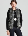 Send your style on an exotic quest in a faux-fur Karen Kane vest touting a textured silhouette for untamed attitude.