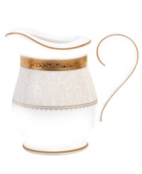 Noritake makes any occasion memorable with the opulent Odessa Gold creamer. Bands of etched gold and pale gray with delicate blooms adorn classic bone china.