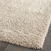 Safavieh Shag Collection SG151-1313 Beige Shag Area Rug, 5-Feet 3-Inch by 7-Feet 6-Inch