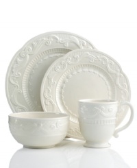 Raised florals, scrolls and lattice detail in the style of Fitz and Floyd's white dinnerware grace the Ricamo place settings with traditional charm. Pair with multicolored pieces to put your own spin on casual country dining.