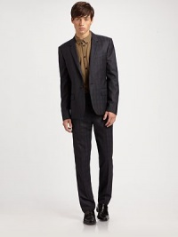 A new standard in dressing is cut with slim, modern lines in premier wool. Pair it with the Donnie Suiting Pants, chinos or even jeans. Two-button closureChest welt, waist flap pocketsRear double flapsFully linedWoolDry cleanImported