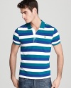 Rich in color and with a collar you can pop, this classic-fit stripe pique polo works well with jeans and shorts for a fun, smart look.