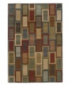 A definitive mid-century modern statement, the Yorkville area rug depicts a smart geometric design in a vivid color arrangement. This contemporary home accent is constructed of soft, low pile fibers for an exquisite finish to any room decor. (Clearance)