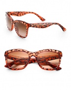 Be the cat's meow in these leopard-printed plastic frames. Available in orange frames with brown gradient lenses or leopard with brown gradient lens.Plastic temples with gold logo100% UV ProtectionMade in Italy 