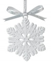 A traditional symbol of the winter season, this unique snowflake ornament features ornate craftsmanship in pure white porcelain. From Wedgwood.