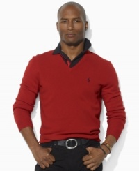 A classic V-neck sweater is crafted from luxe Italian wool, making it the perfect preppy layering piece as the temperature begins to cool.