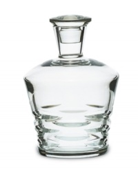 Classic technique, modern beauty. Crafted of fine Baccarat crystal, the Lola decanter pairs horizontal wedge cuts with a  silhouette that radiates grace and sophistication.