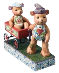 Two little bears crafted with the distinct folk art styling of Jim Shore lend whimsical splendor to your annual Christmas celebration.