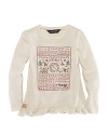 A pretty long-sleeved tee is updated with a festive snowflake print and a ruffled hem.