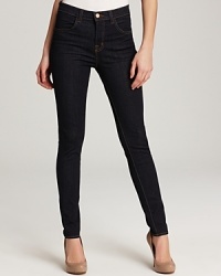 A high rise makes these super-skinny J Brand jeans the ideal companion to the season's sophisticated silk blouses--tucked in, of course.