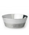 Redefining sophistication, Vera Wang marries modern geometry and classic elegance with this versatile bowl. Sharp lines and traditional ribbing detail combine for a unique, segmented pattern. (Clearance)