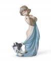 A baby girl and her frisky pup take playtime too far, wrestling over a blankie in Lladro's handcrafted Naughty Puppy figurine.