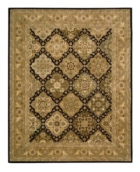 Introduce a combination of elegant Persian and European designs to your traditional home décor with this remarkable Nourison area rug. Hand-tufted with exceptional technique, this natural wool area rug features strands of genuine silk for exquisite detail that redefines luxury.