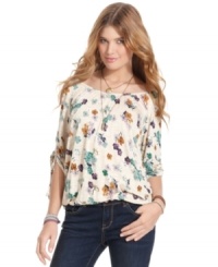 Gathered, three-quarter sleeves and a comfy, blouson fit make this floral-print top from American Rag the sweetest look for fall!