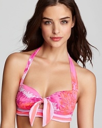 Take girlie style to the beach with this printed bikini from Nanette Lepore. In a floral print with a delicate bow, it's every bit as pretty as you.