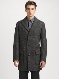 A sleek, single-breasted virgin-wool coat with a touch of stretch for a great fit.Notched collarButton frontPatch pocketsBack ventAbout 33 from shoulder to hem95% virgin wool/5% polyamideDry cleanMade in Italy