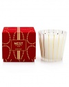 Captures the aroma of a sparkling holiday season. Large, three-wick candle fragranced with inviting notes of pomegranate, mandarin orange, pine, cloves and cinnamon. Housed in an elegant glass vessel and presented in a red velvet box. Created by Laura Slatkin. Approximately 100 hours of burn time. 19.7 oz.